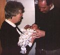 "Daddy, you can hold me when Grandma's finished!"